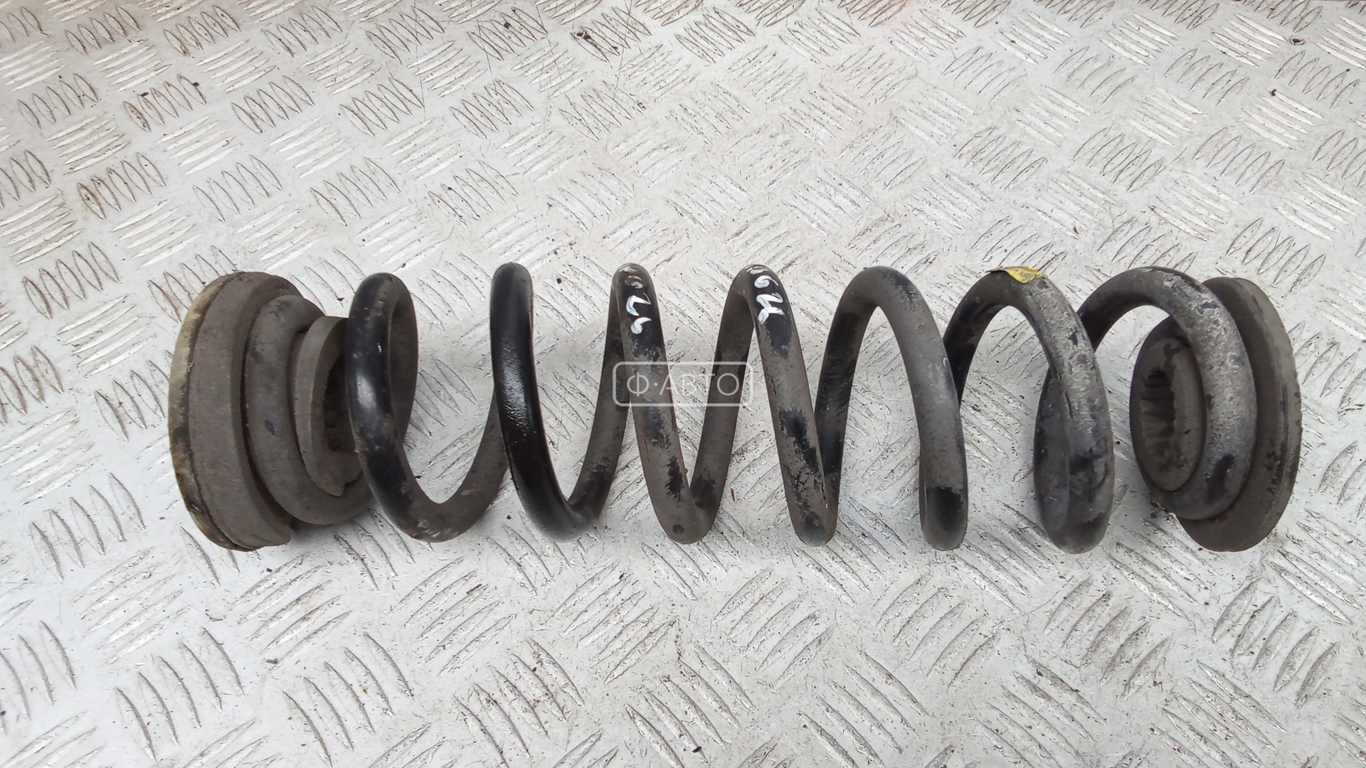 Пружина задняя