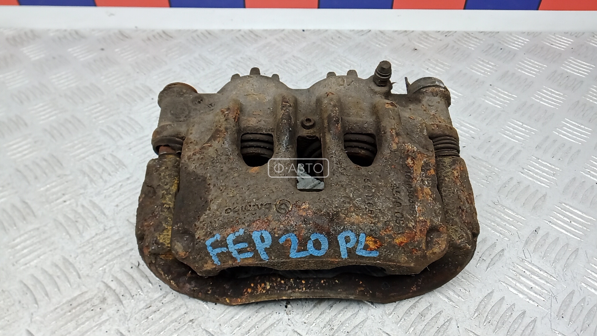 Суппорт тормозной передний левый