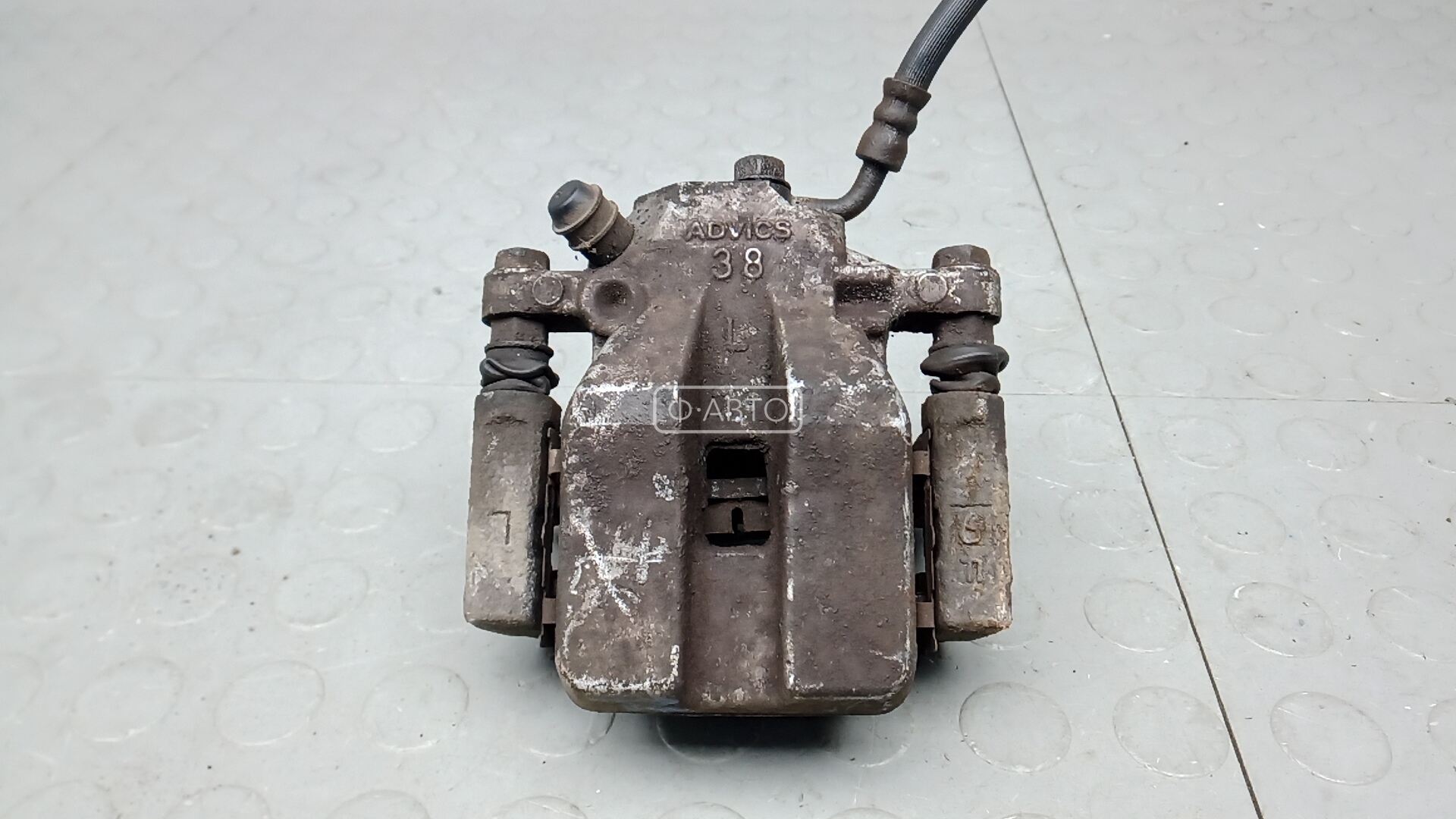 Суппорт тормозной задний левый