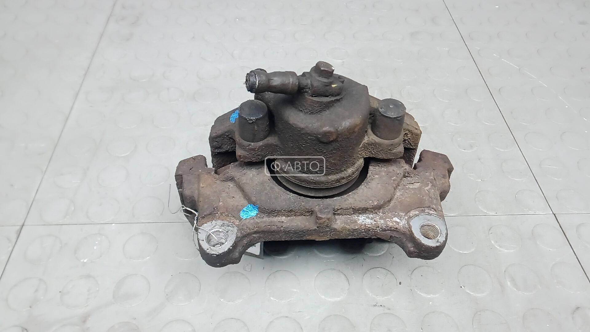 Суппорт тормозной передний левый