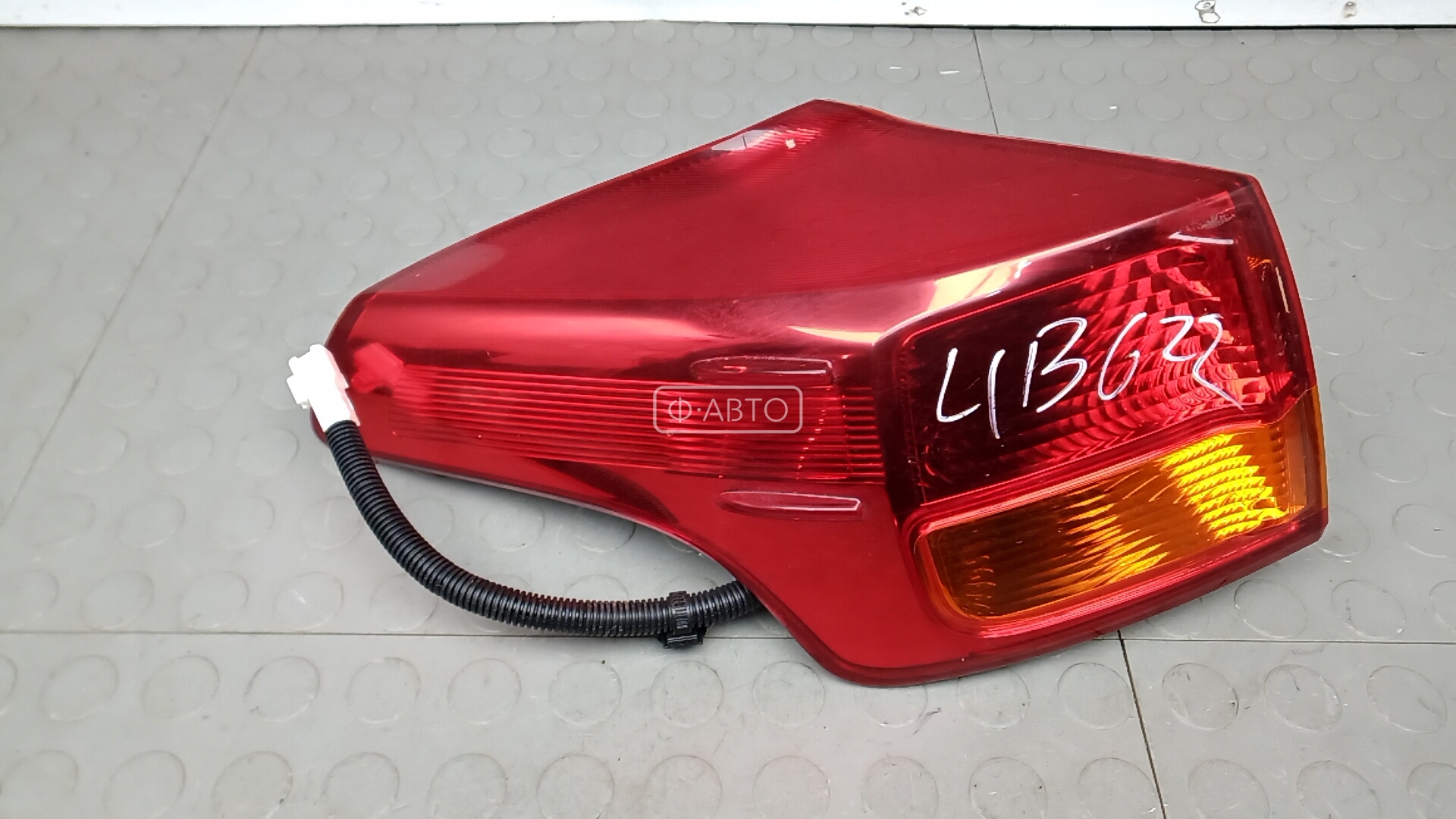 Фонарь задний левый