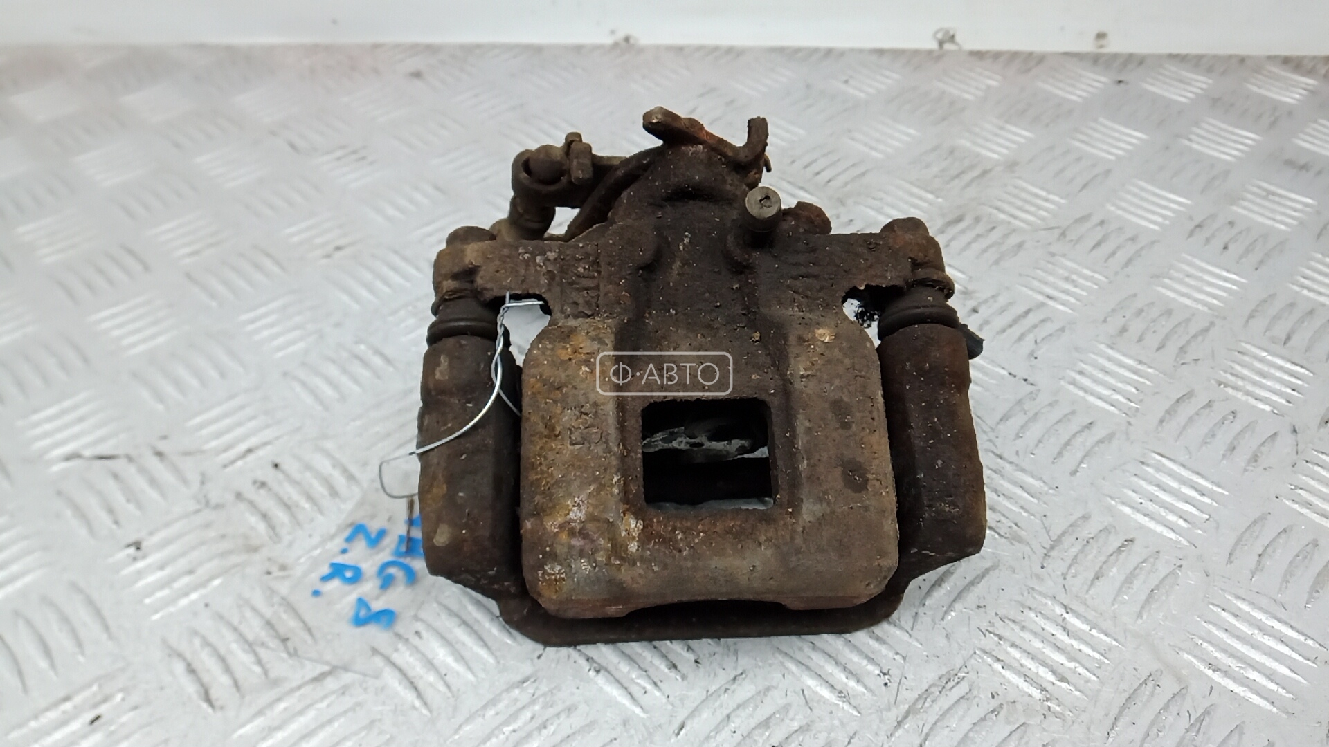 Суппорт тормозной задний правый