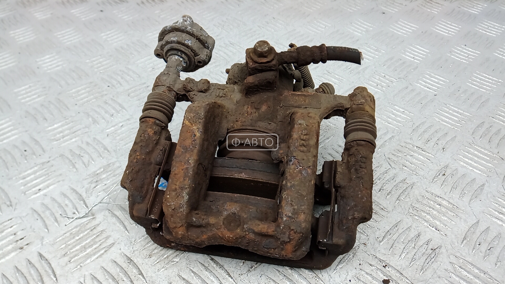 Суппорт тормозной задний правый