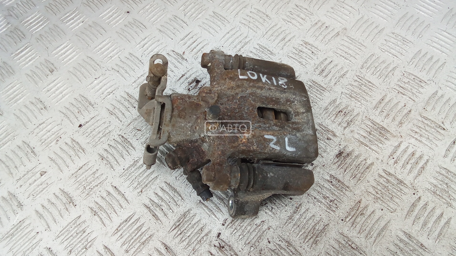 Суппорт тормозной задний левый