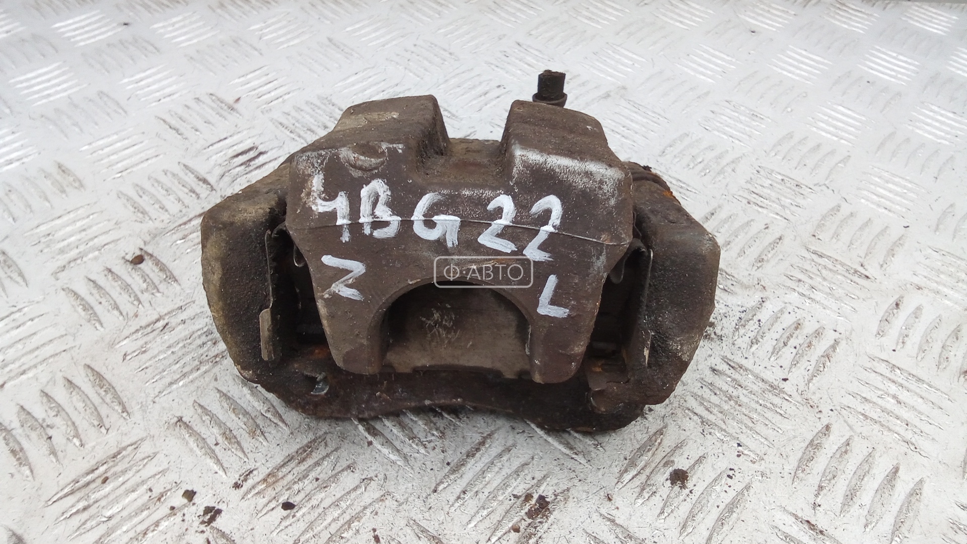 Суппорт тормозной задний левый