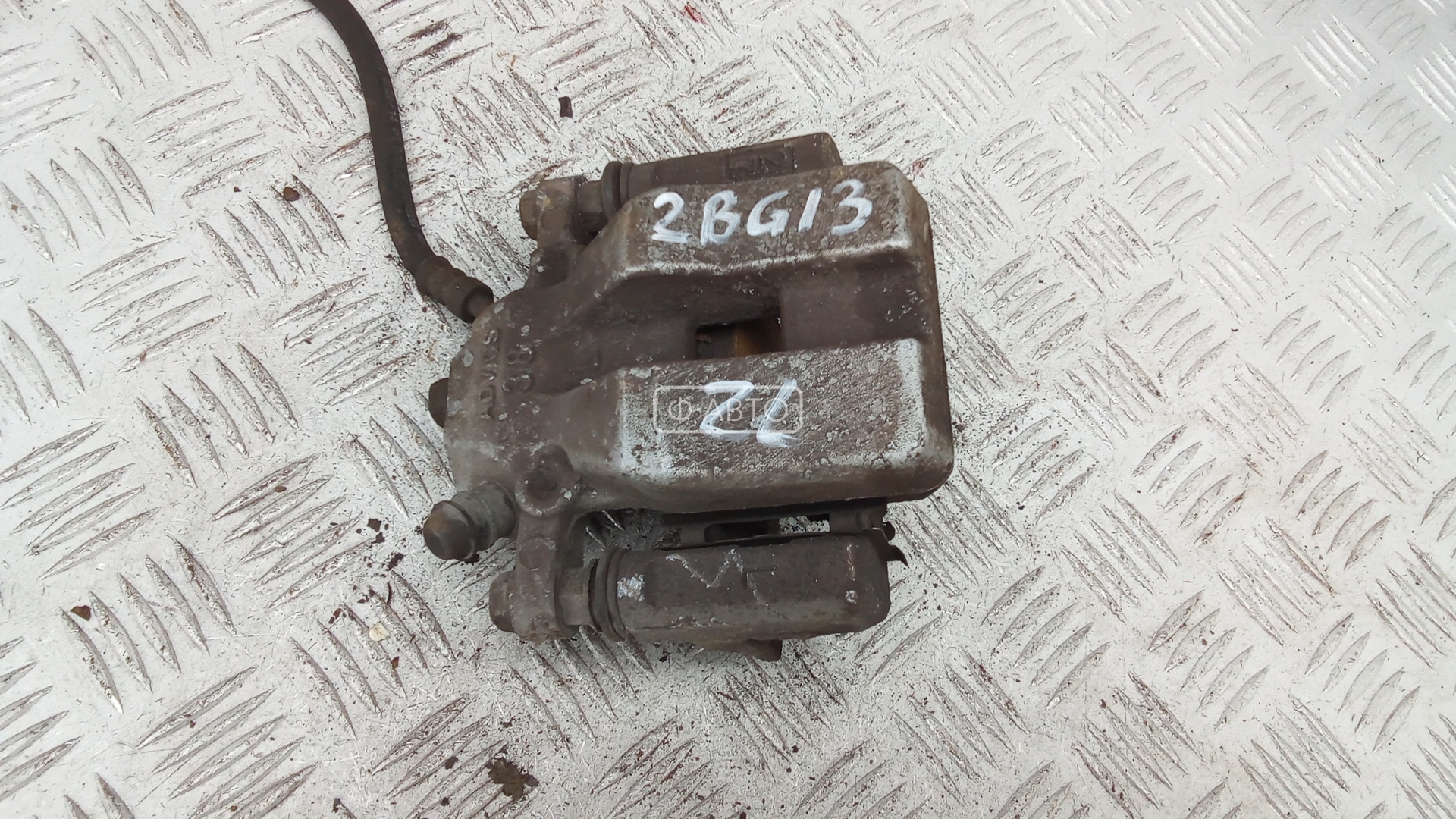 Суппорт тормозной задний левый