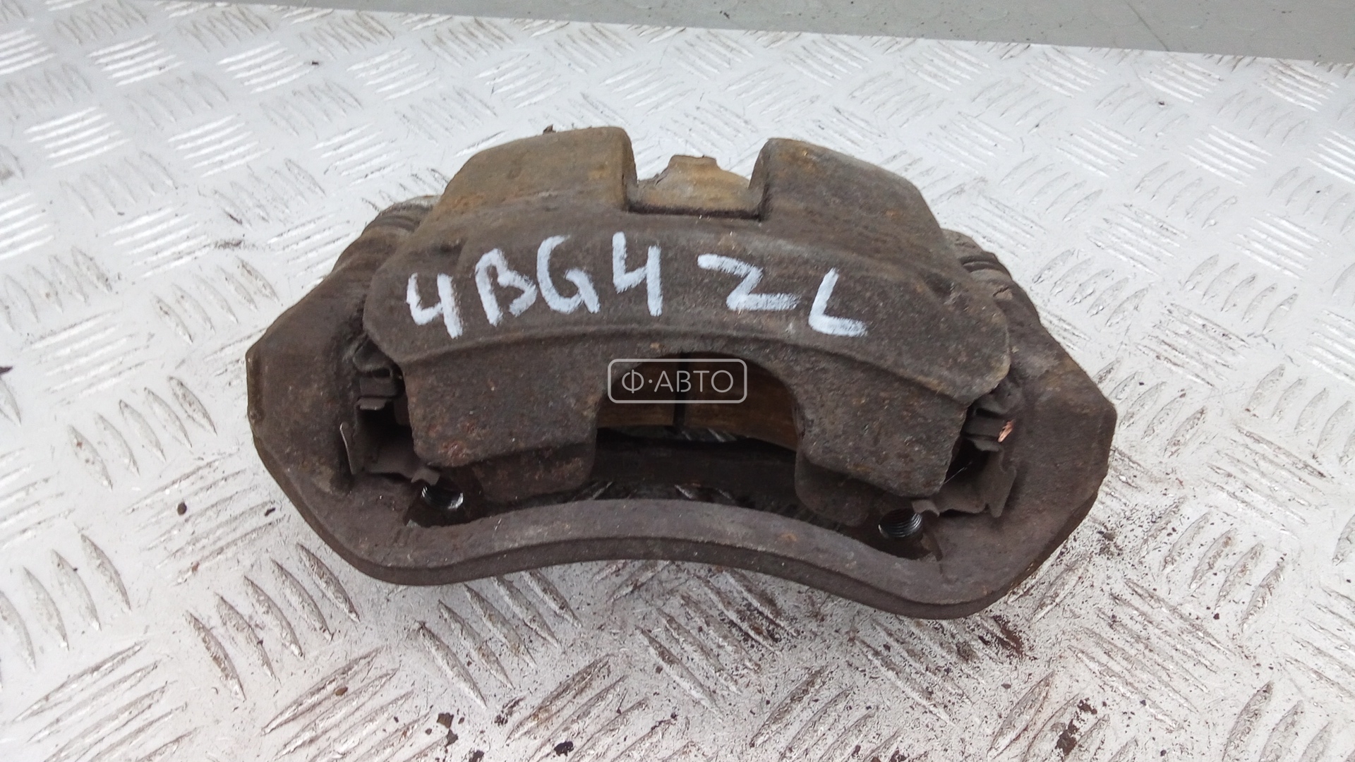 Суппорт тормозной задний левый