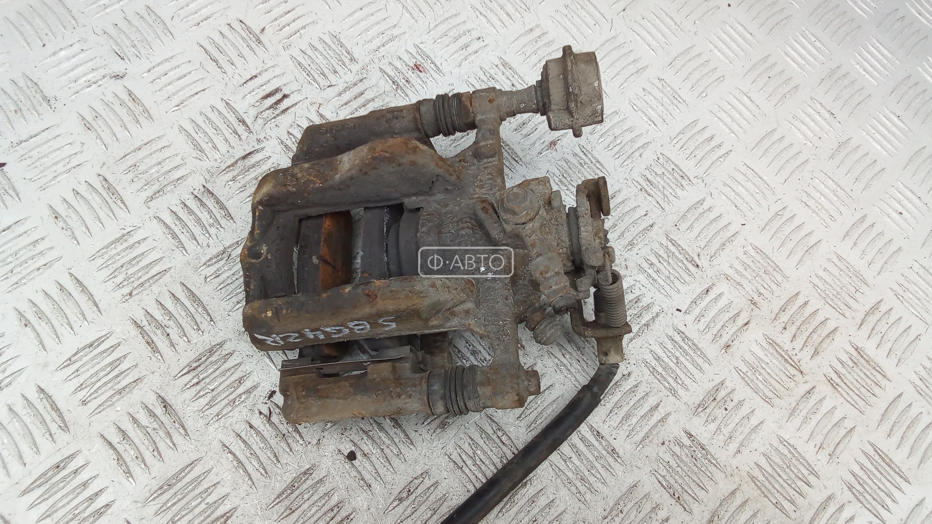 Суппорт тормозной задний правый