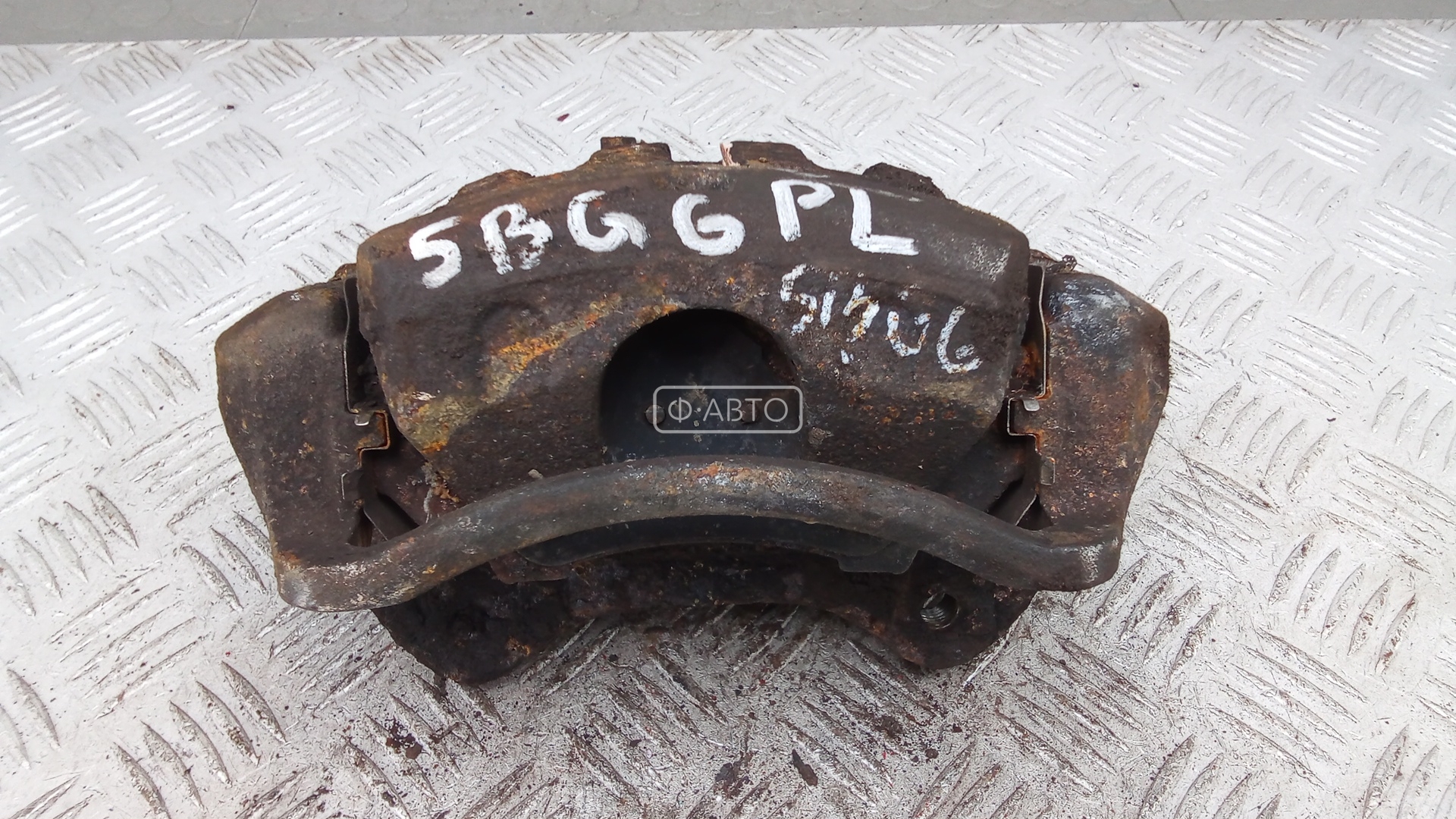 Суппорт тормозной передний левый