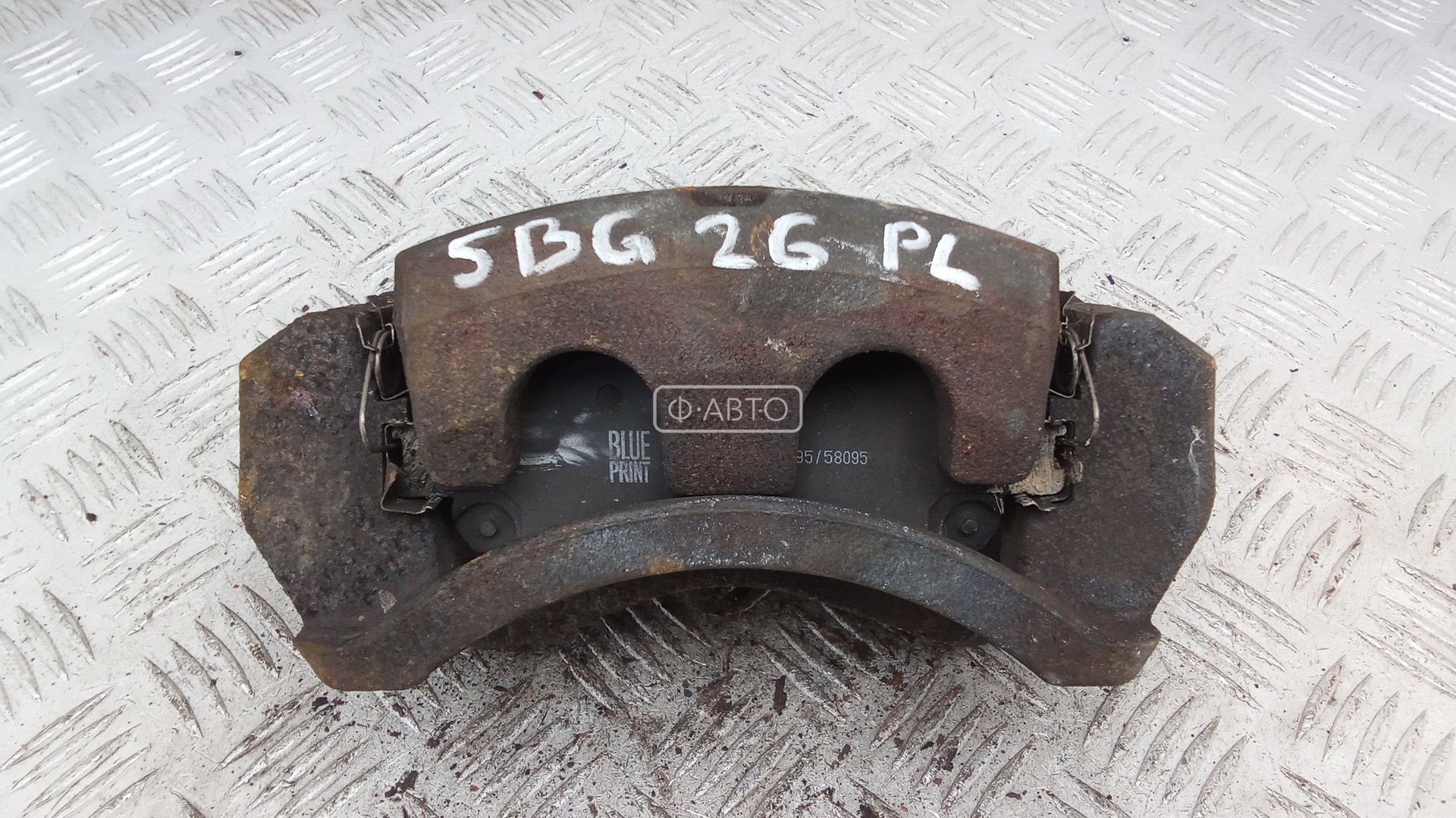 Суппорт тормозной передний левый