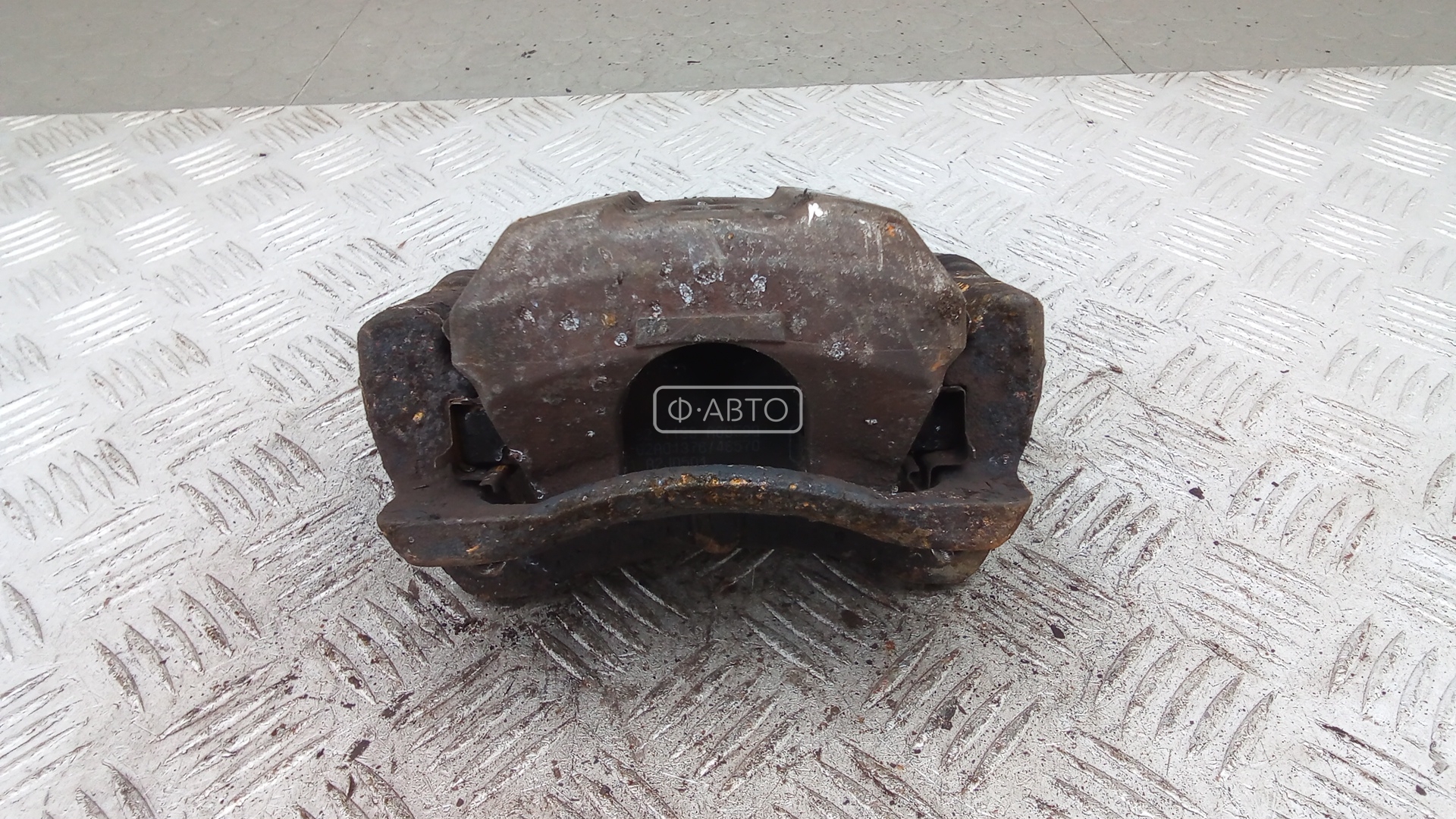 Суппорт тормозной передний левый
