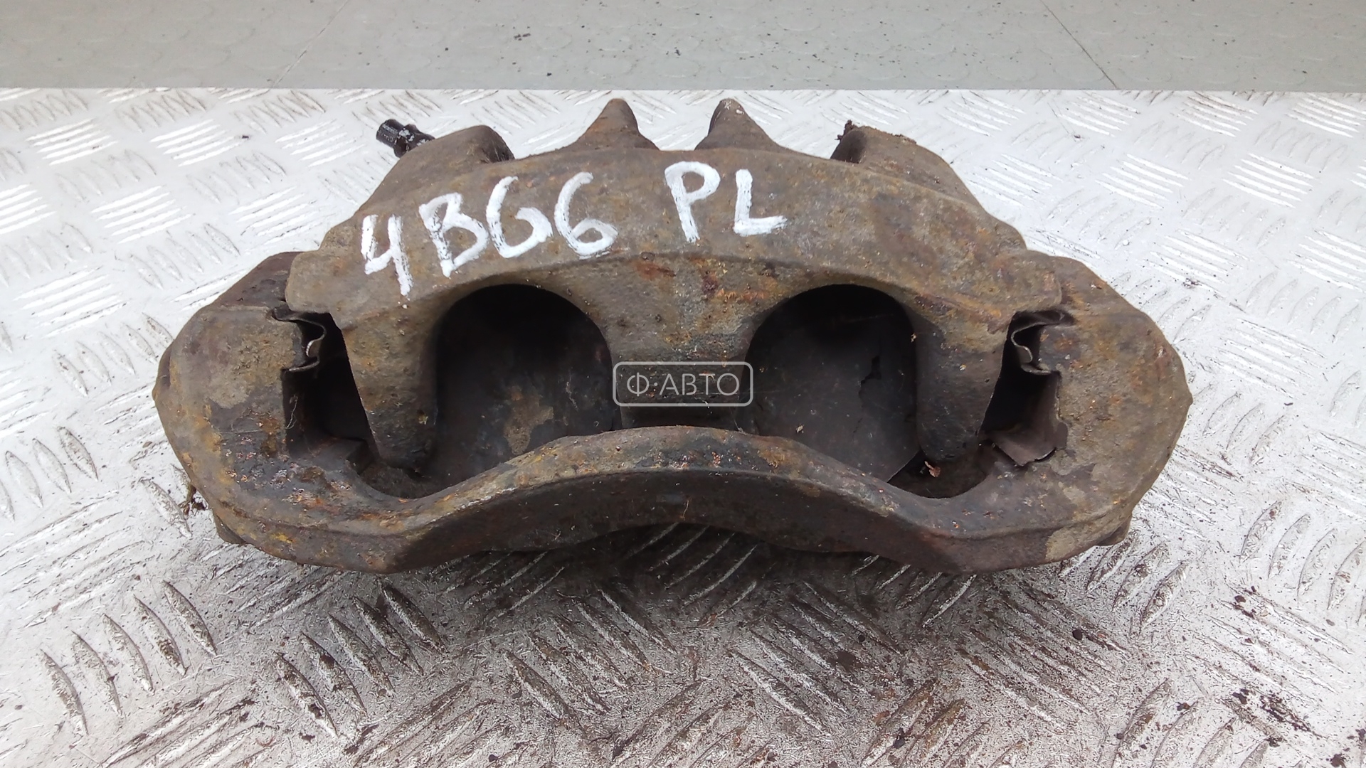 Суппорт тормозной передний левый