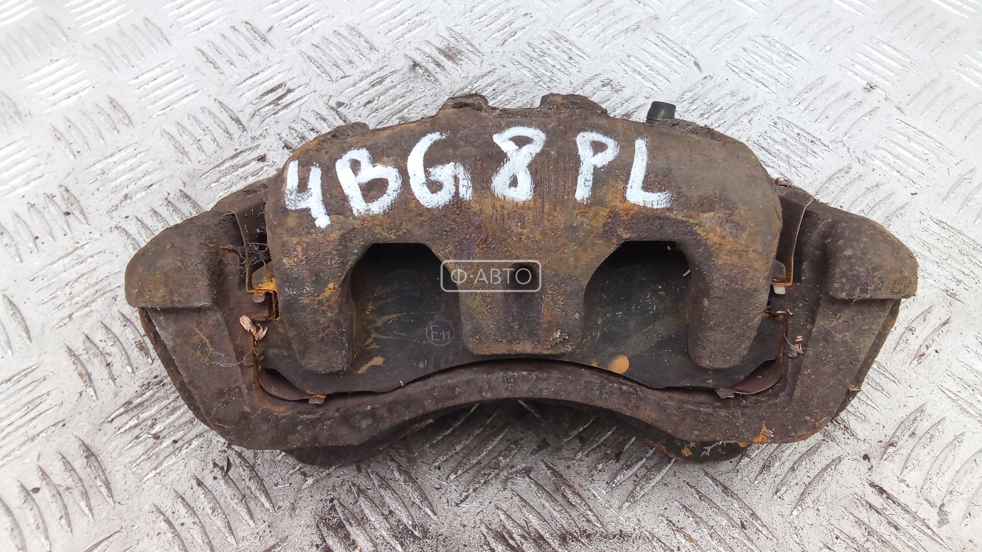 Суппорт тормозной передний левый