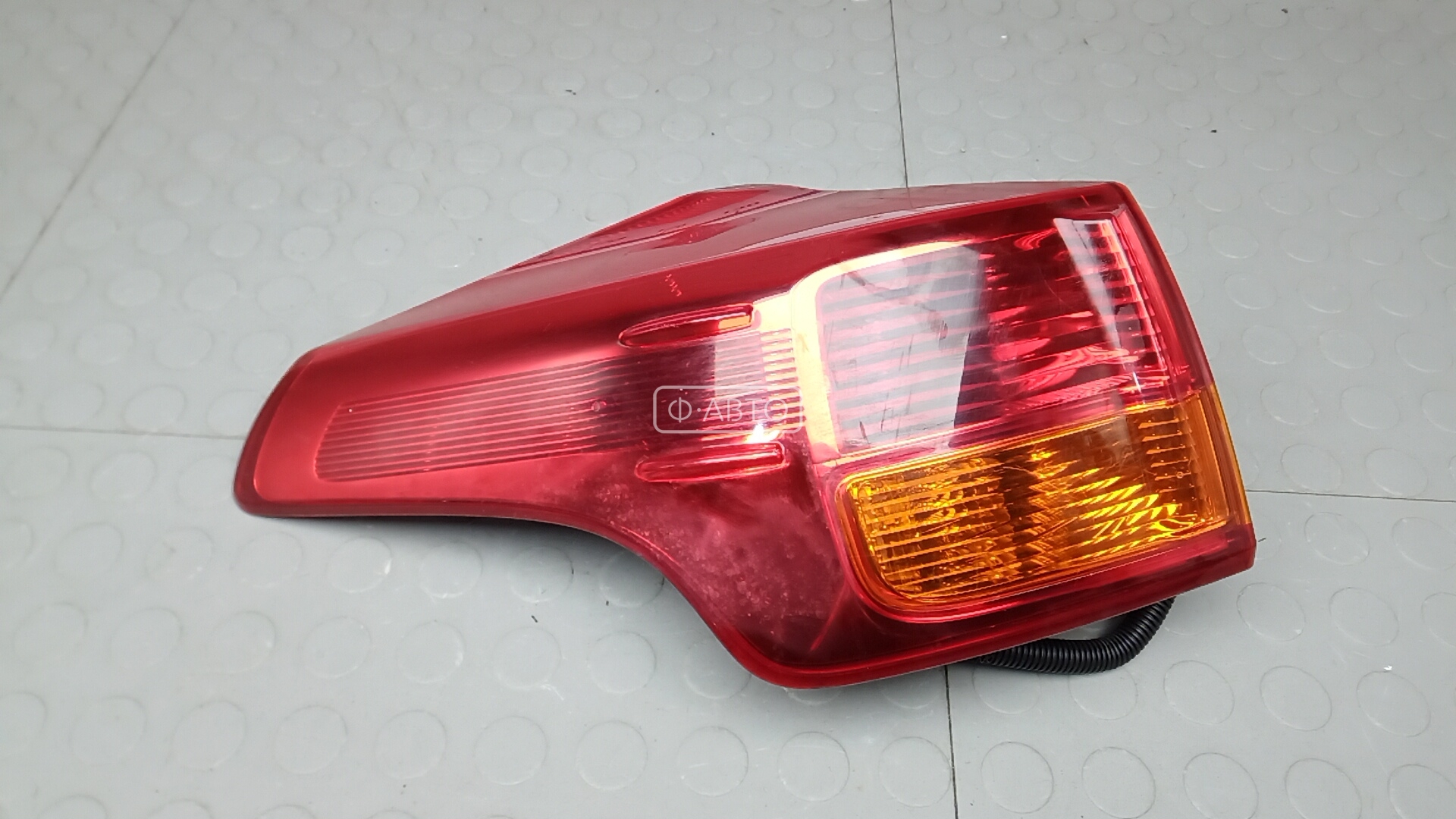 Фонарь задний левый