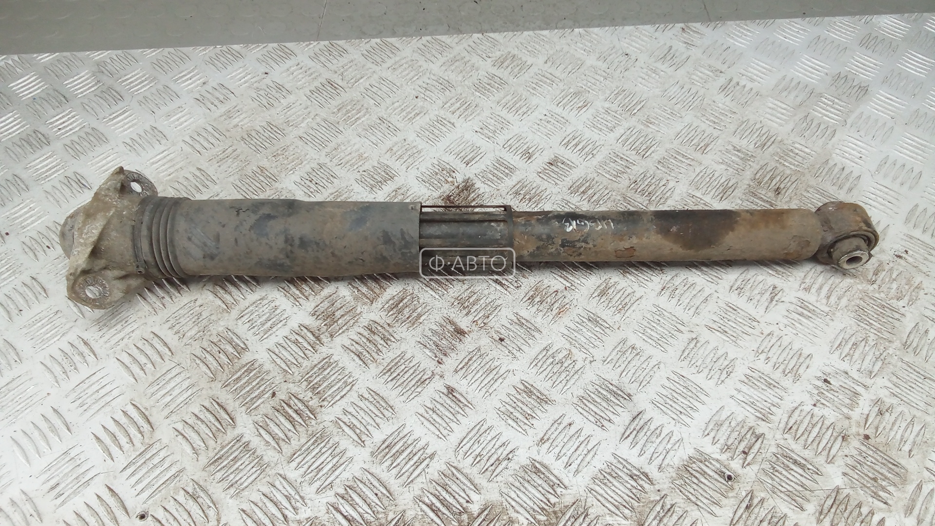 Амортизатор задней балки