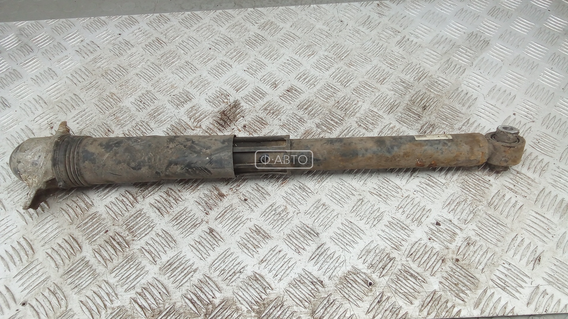 Амортизатор задней балки