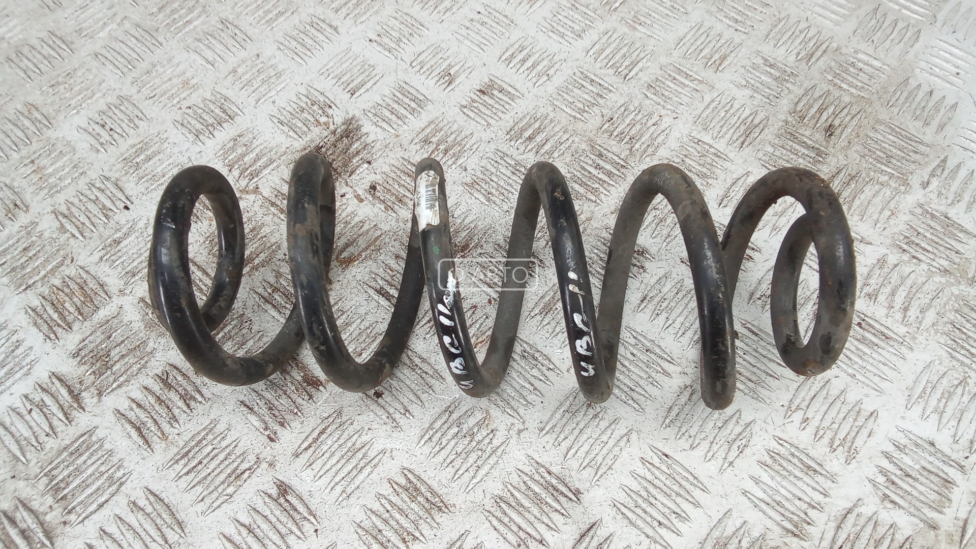 Пружина задняя