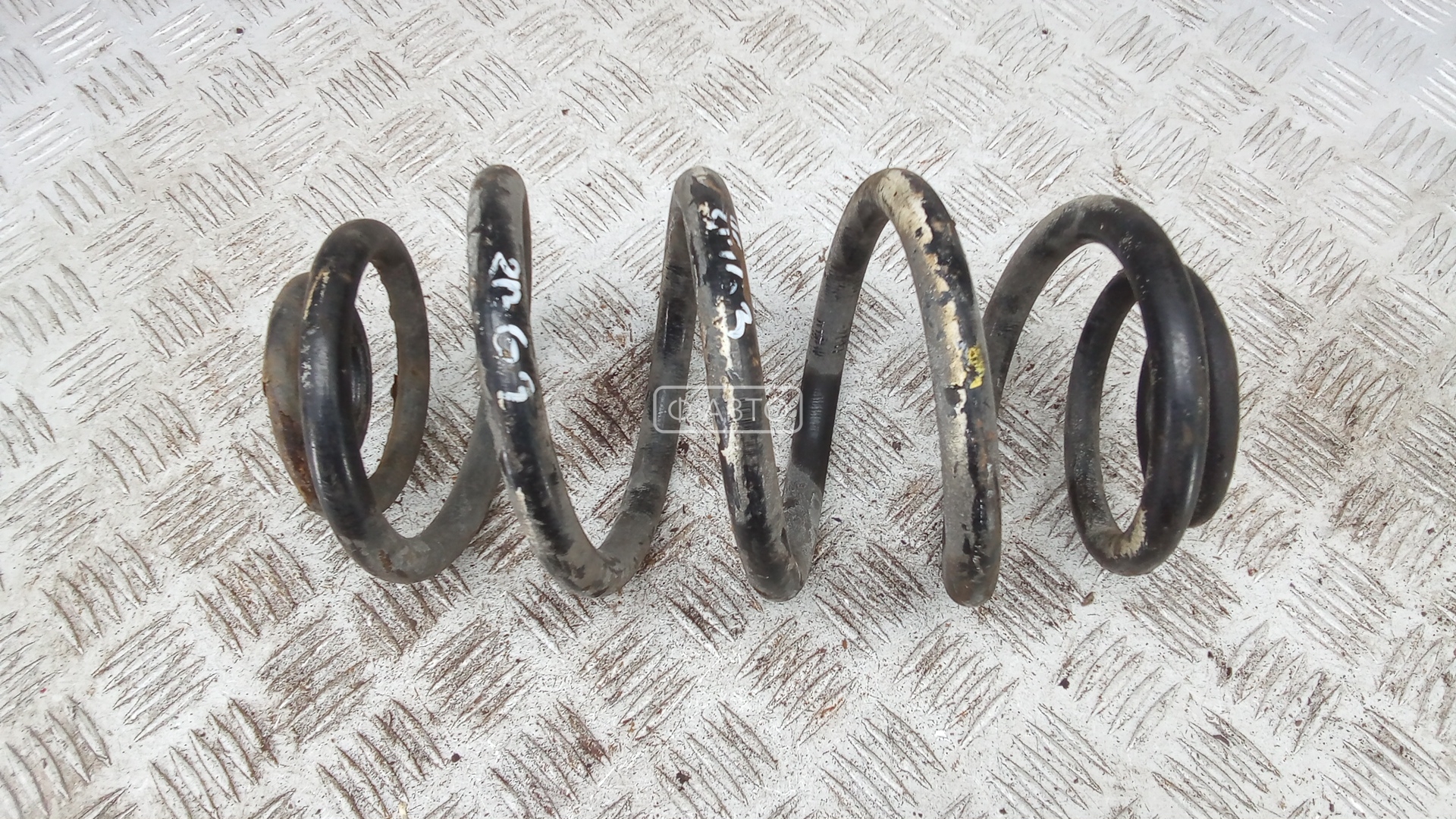 Пружина задняя