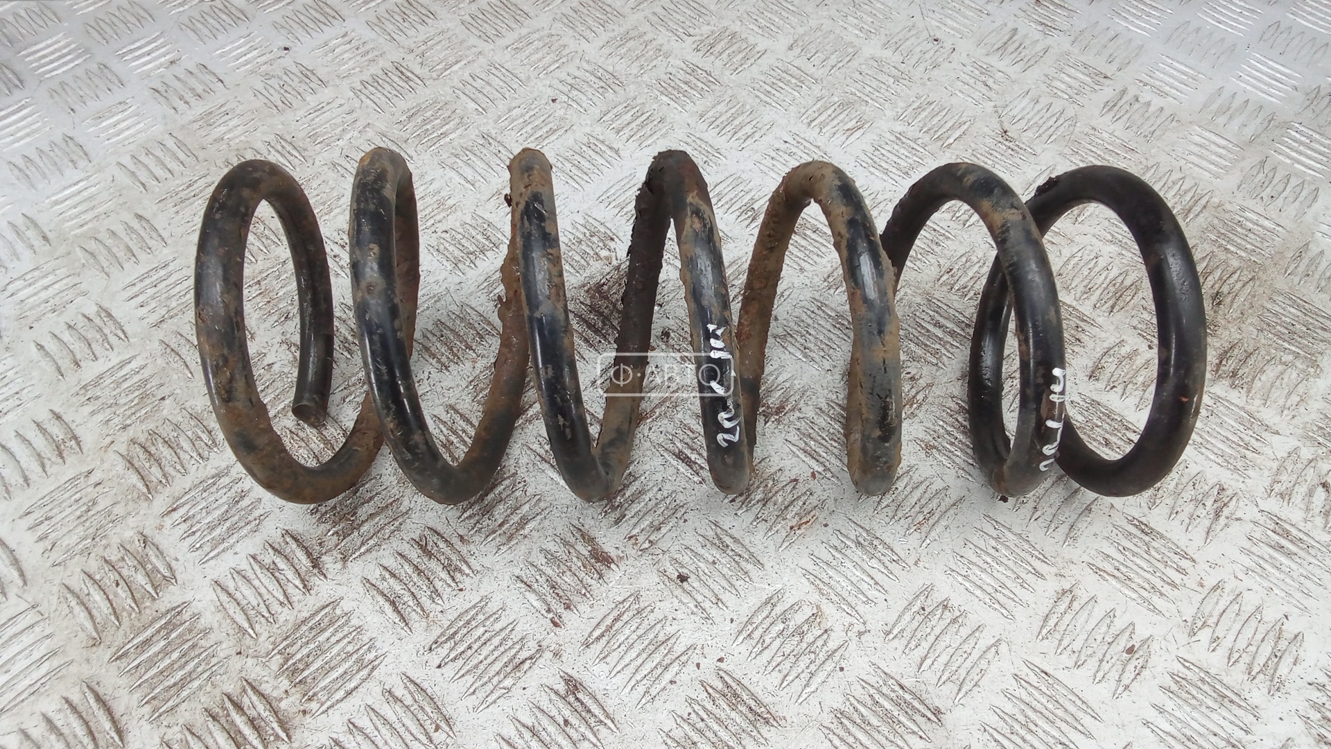 Пружина задняя