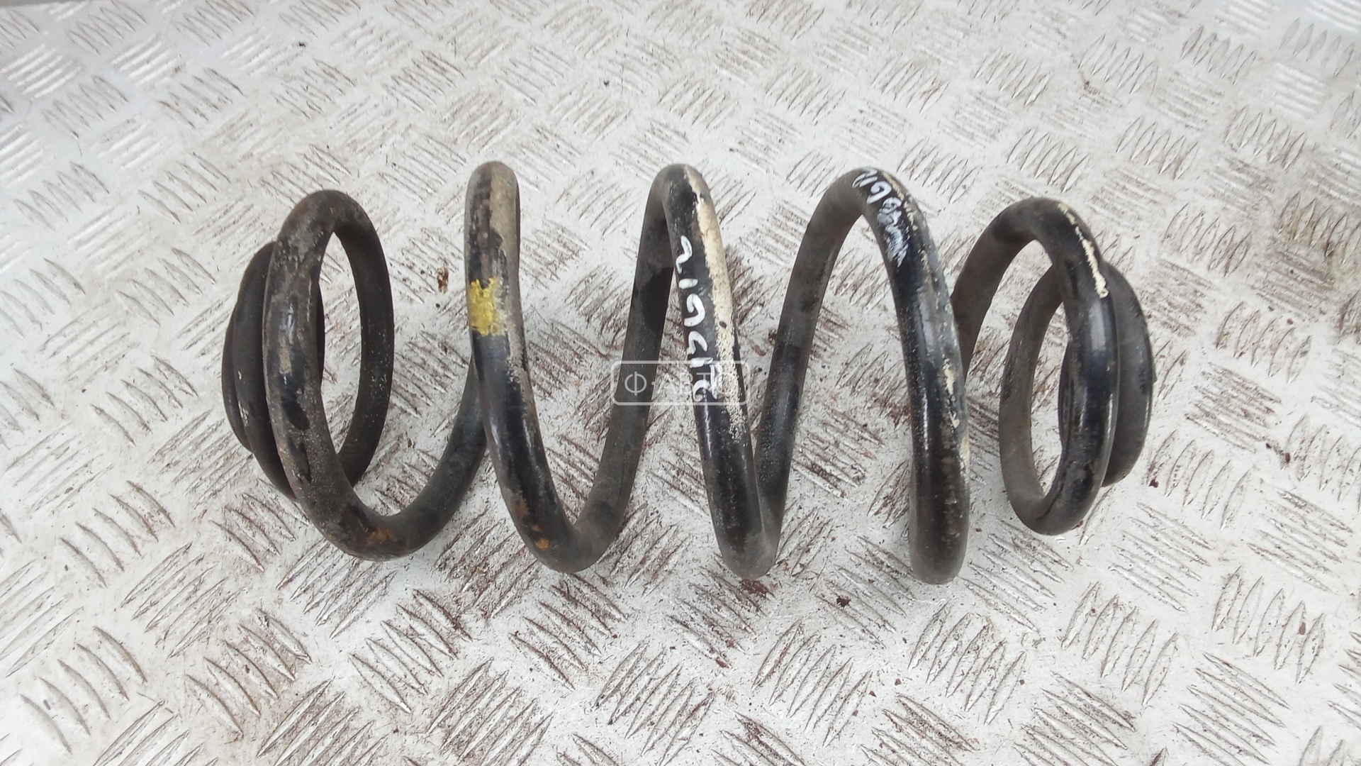 Пружина задняя