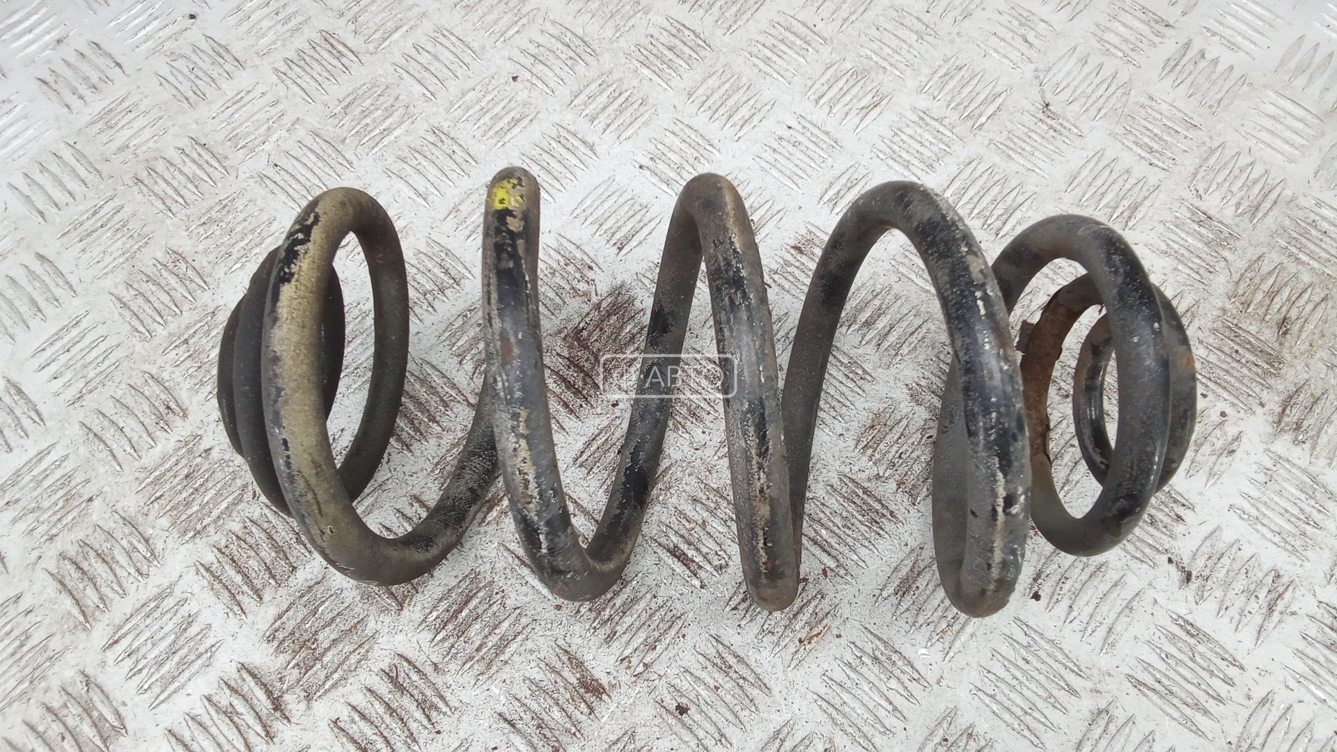 Пружина задняя