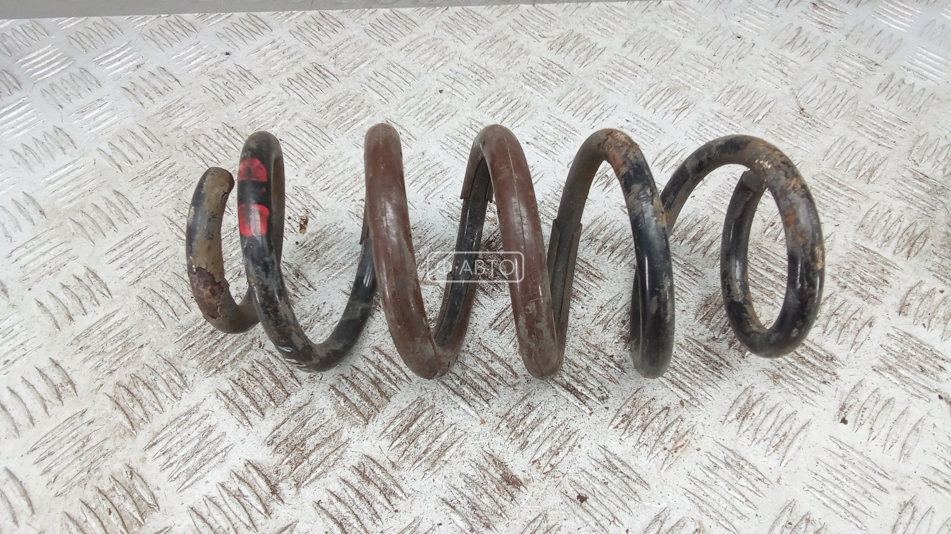 Пружина задняя