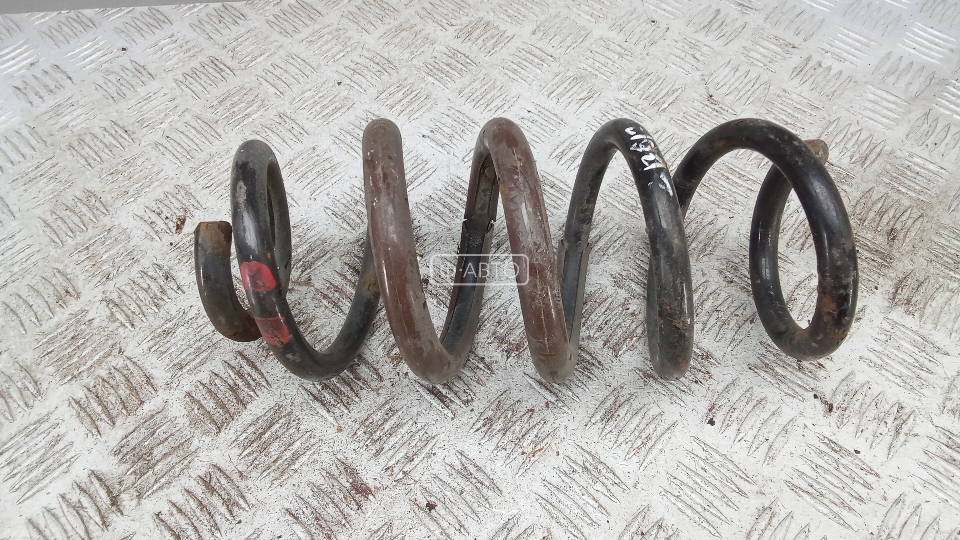 Пружина задняя