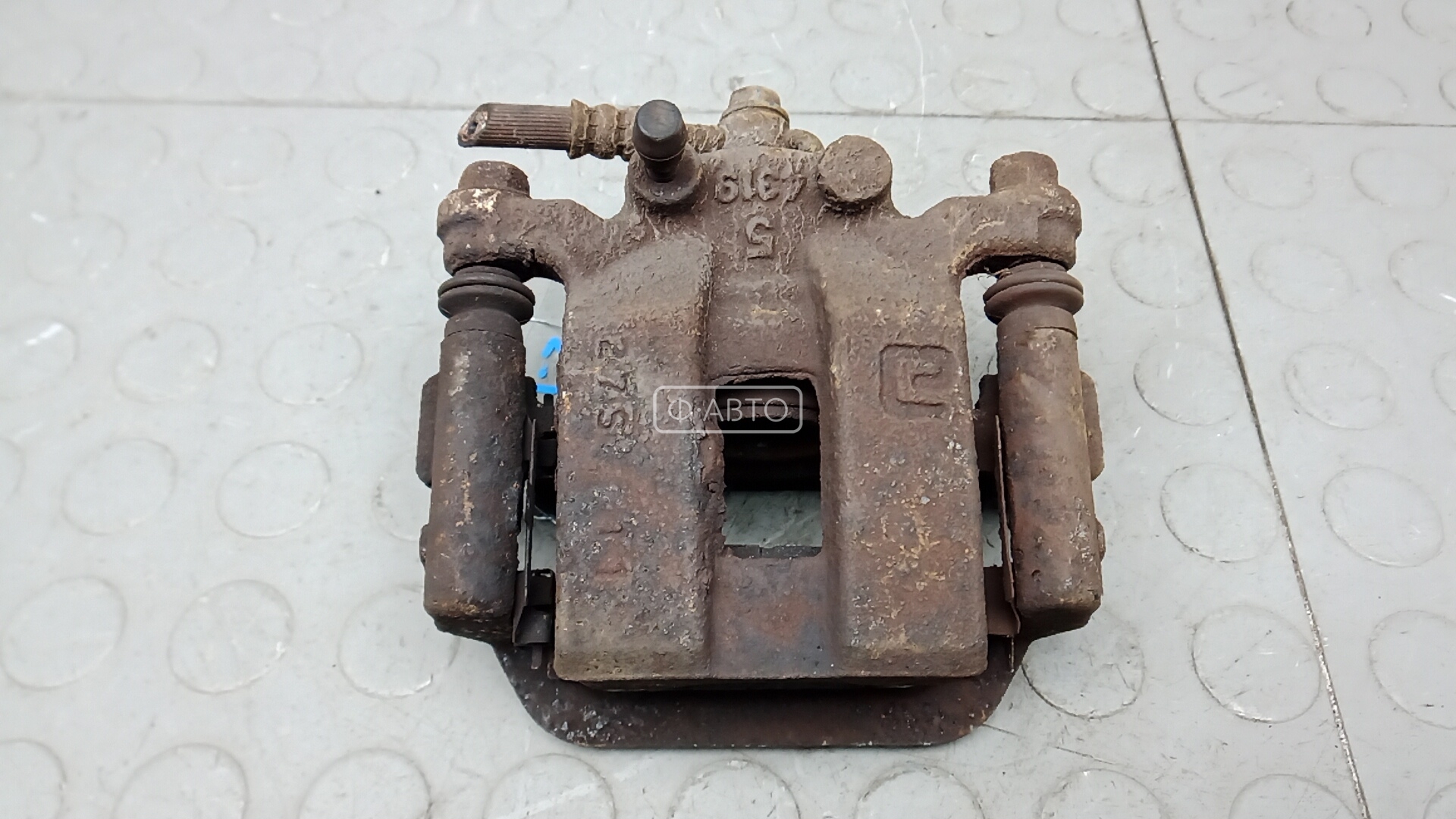 Суппорт тормозной задний левый