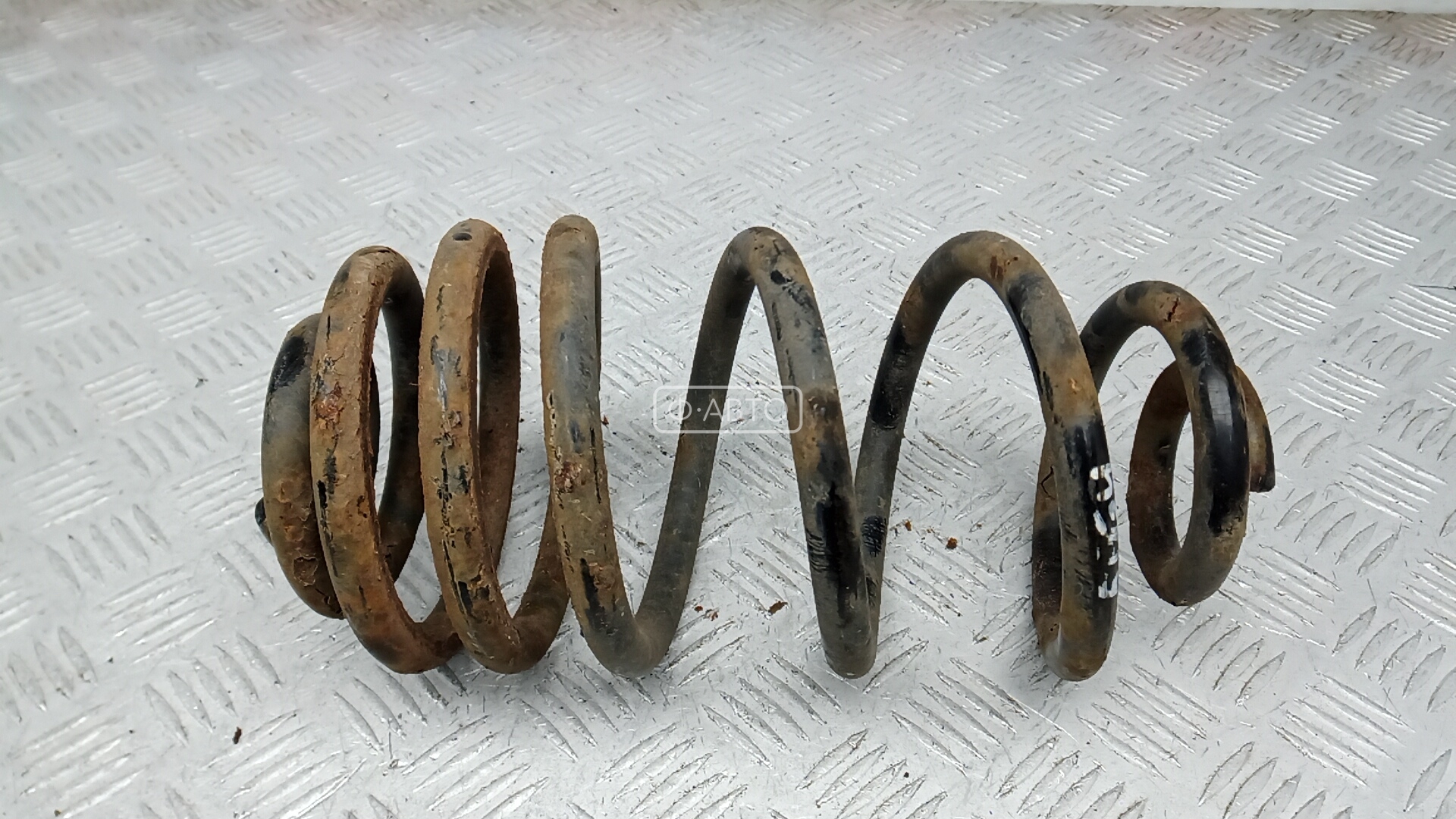 Пружина задняя