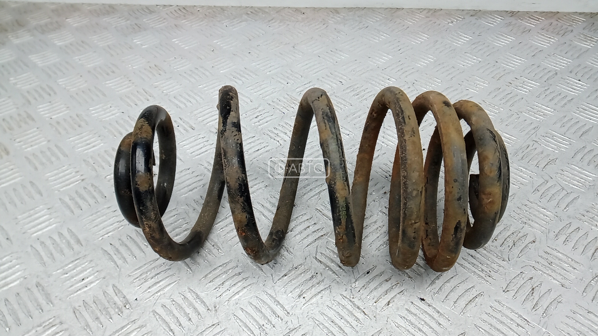 Пружина задняя