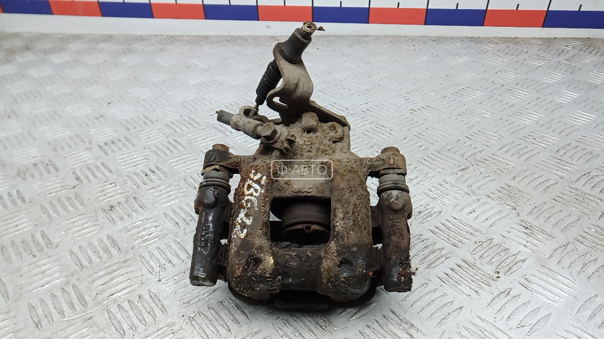 Суппорт тормозной задний левый