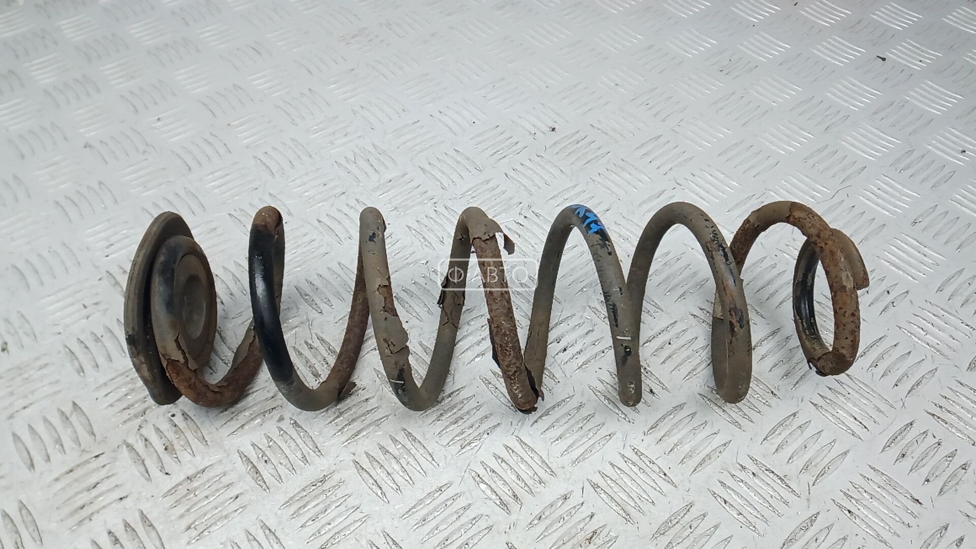 Пружина задняя