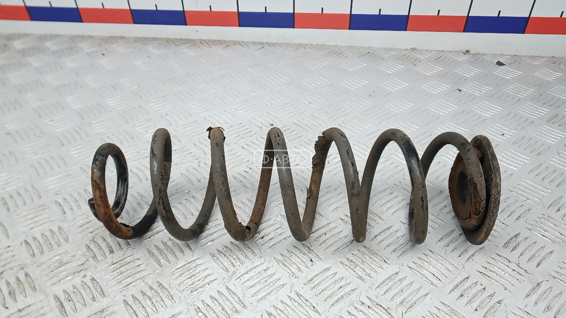 Пружина задняя