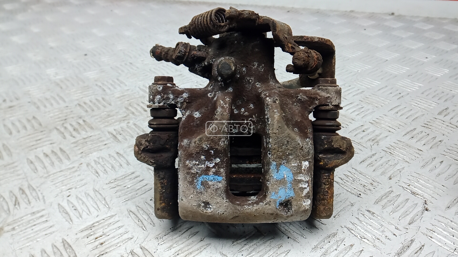 Суппорт тормозной задний левый