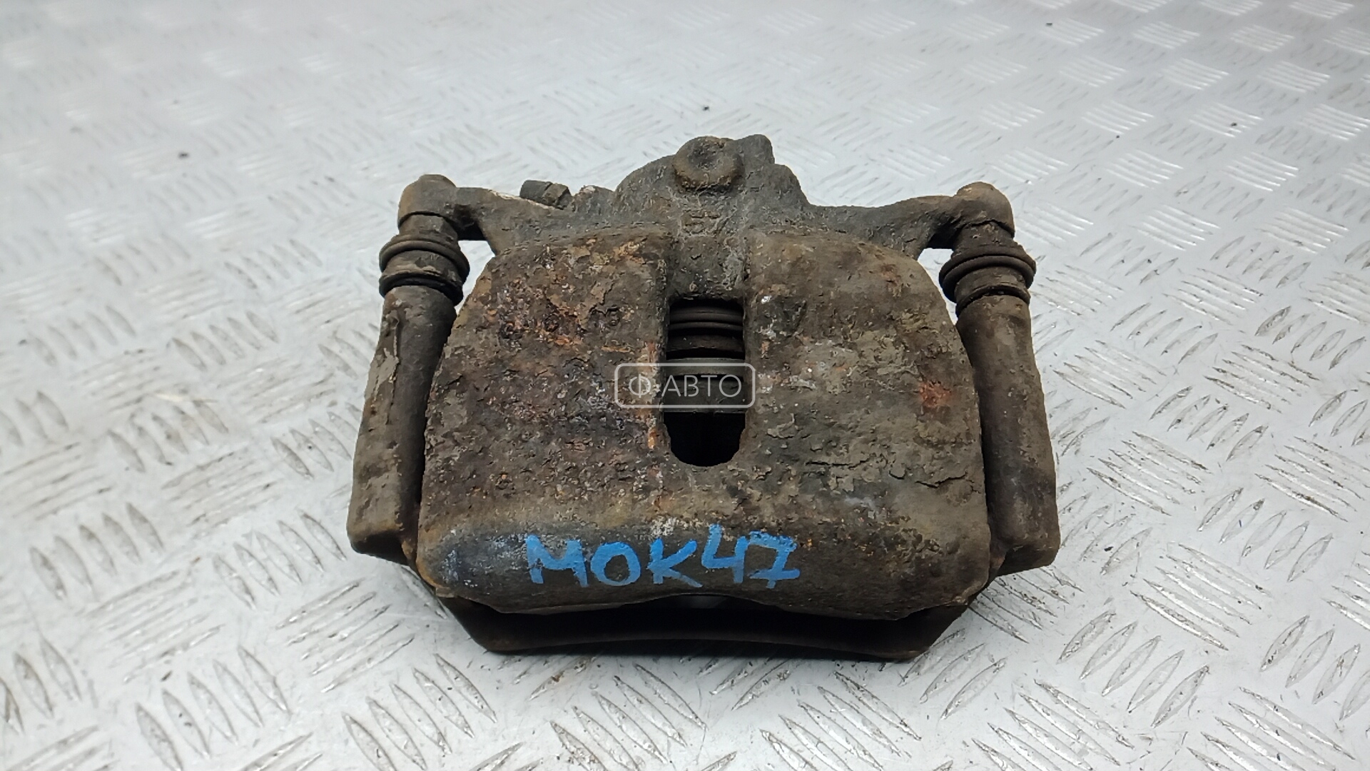 Суппорт тормозной передний левый