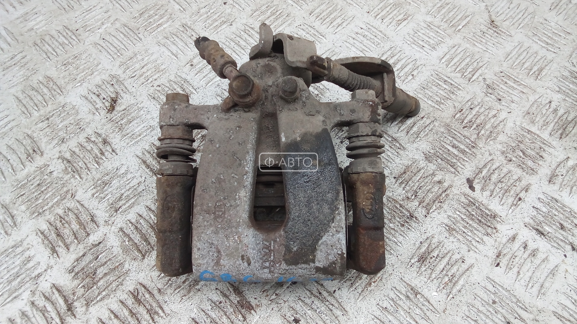 Суппорт тормозной задний правый