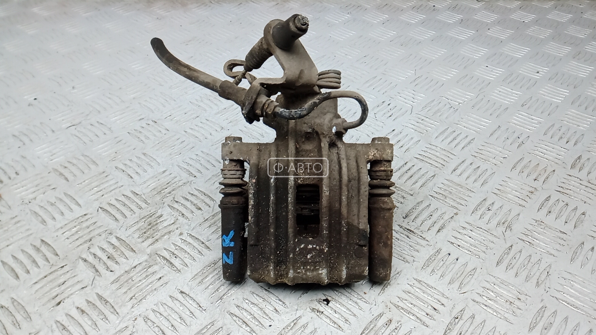 Суппорт тормозной задний правый