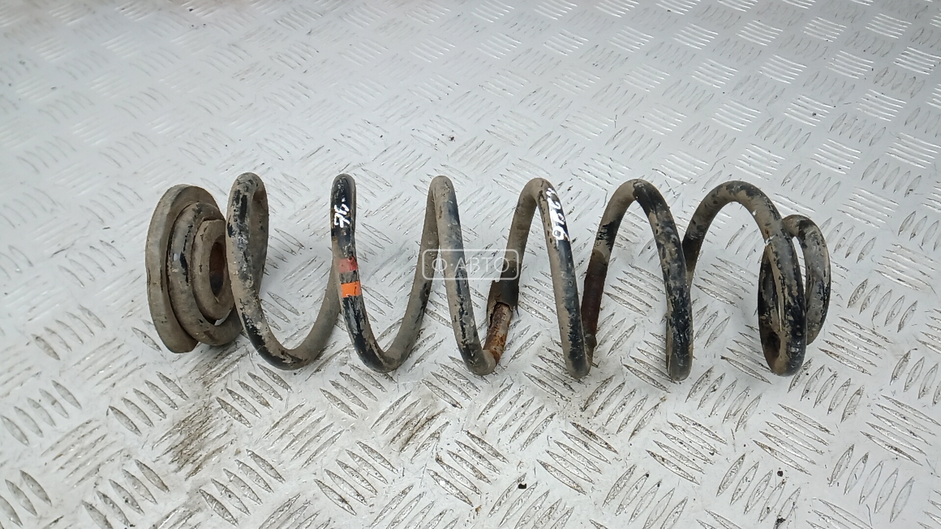 Пружина задняя