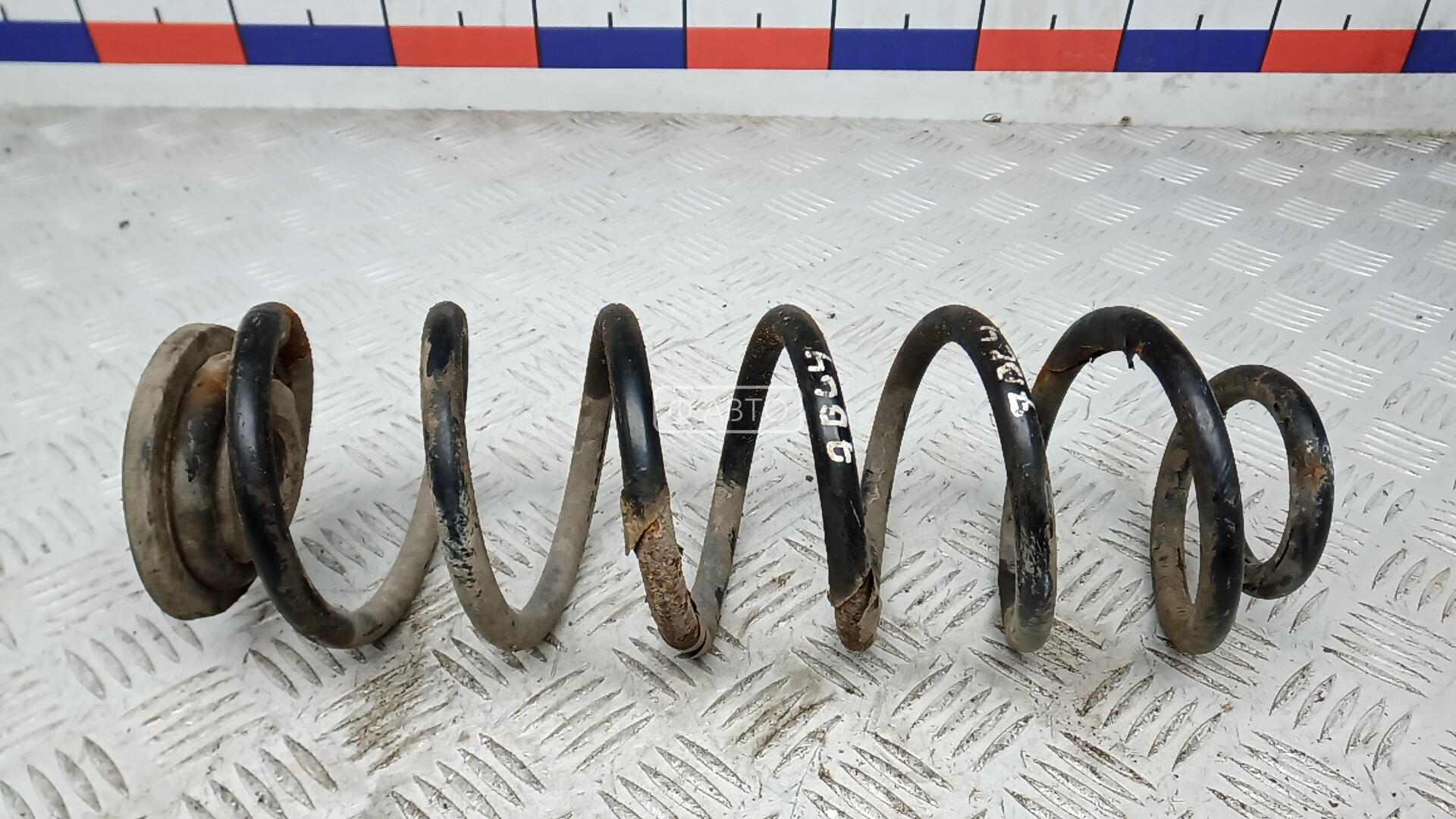 Пружина задняя