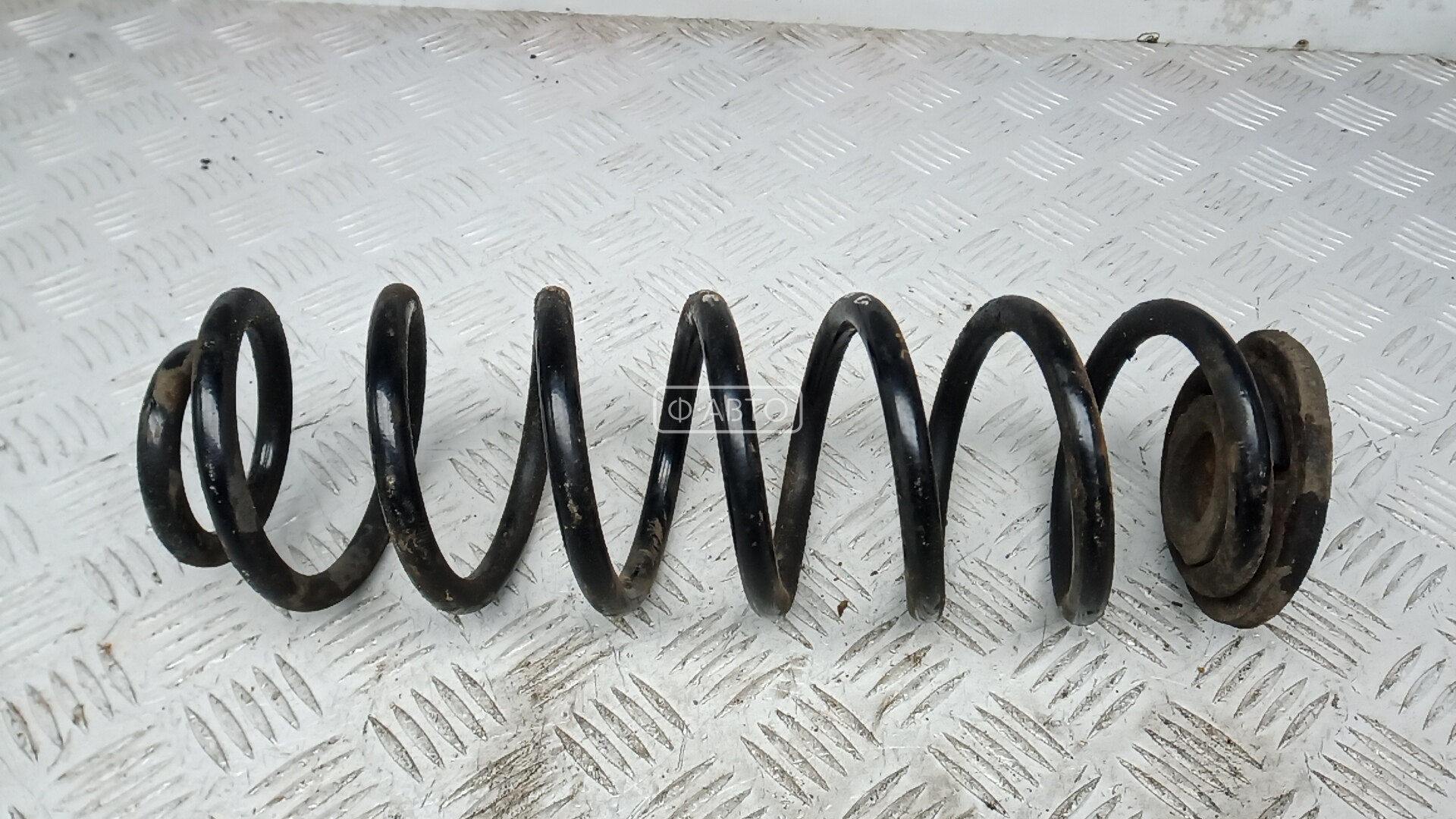 Пружина задняя