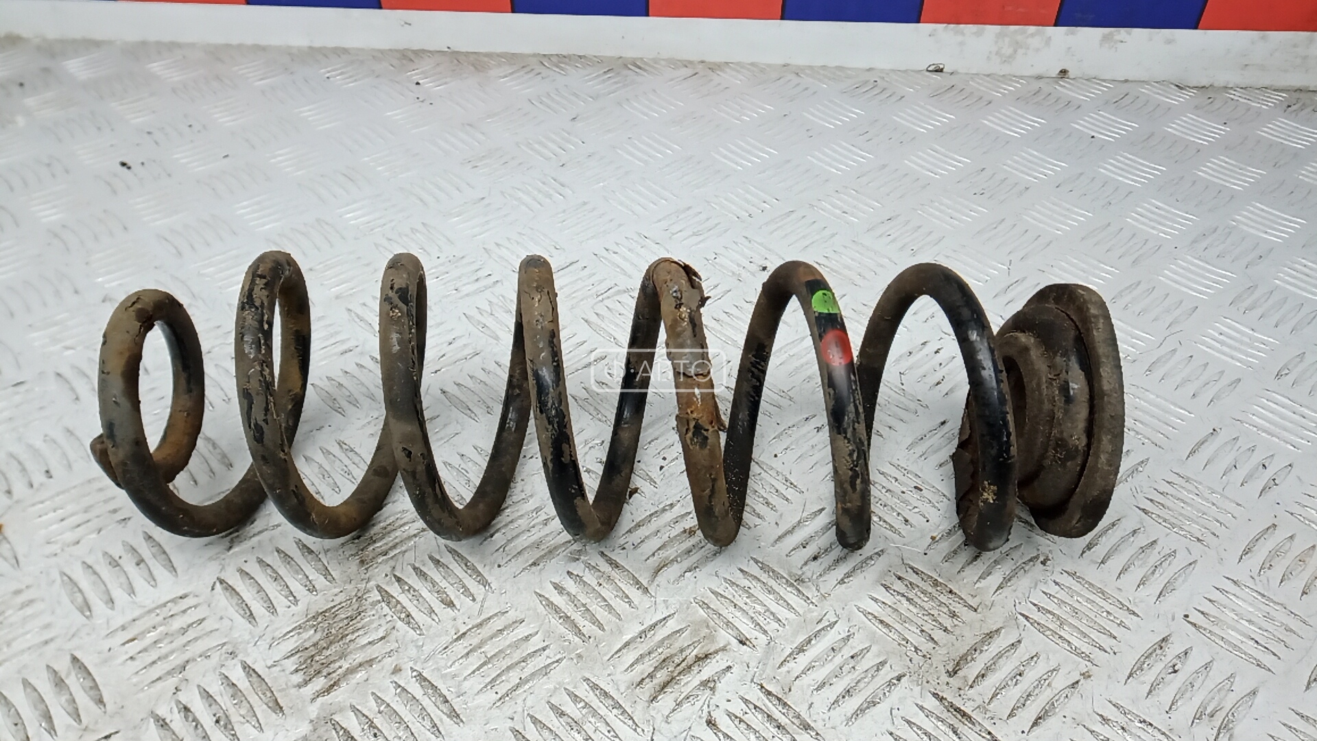 Пружина задняя