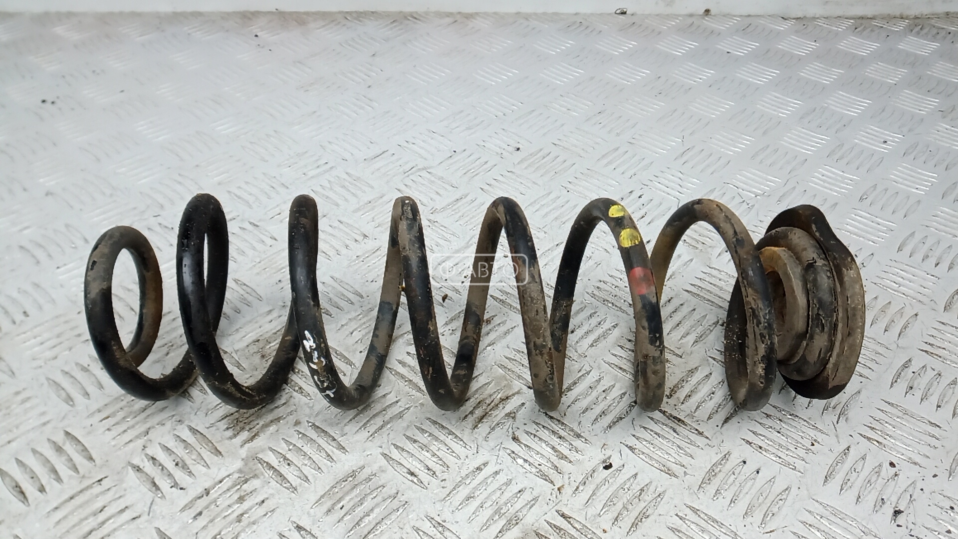 Пружина задняя