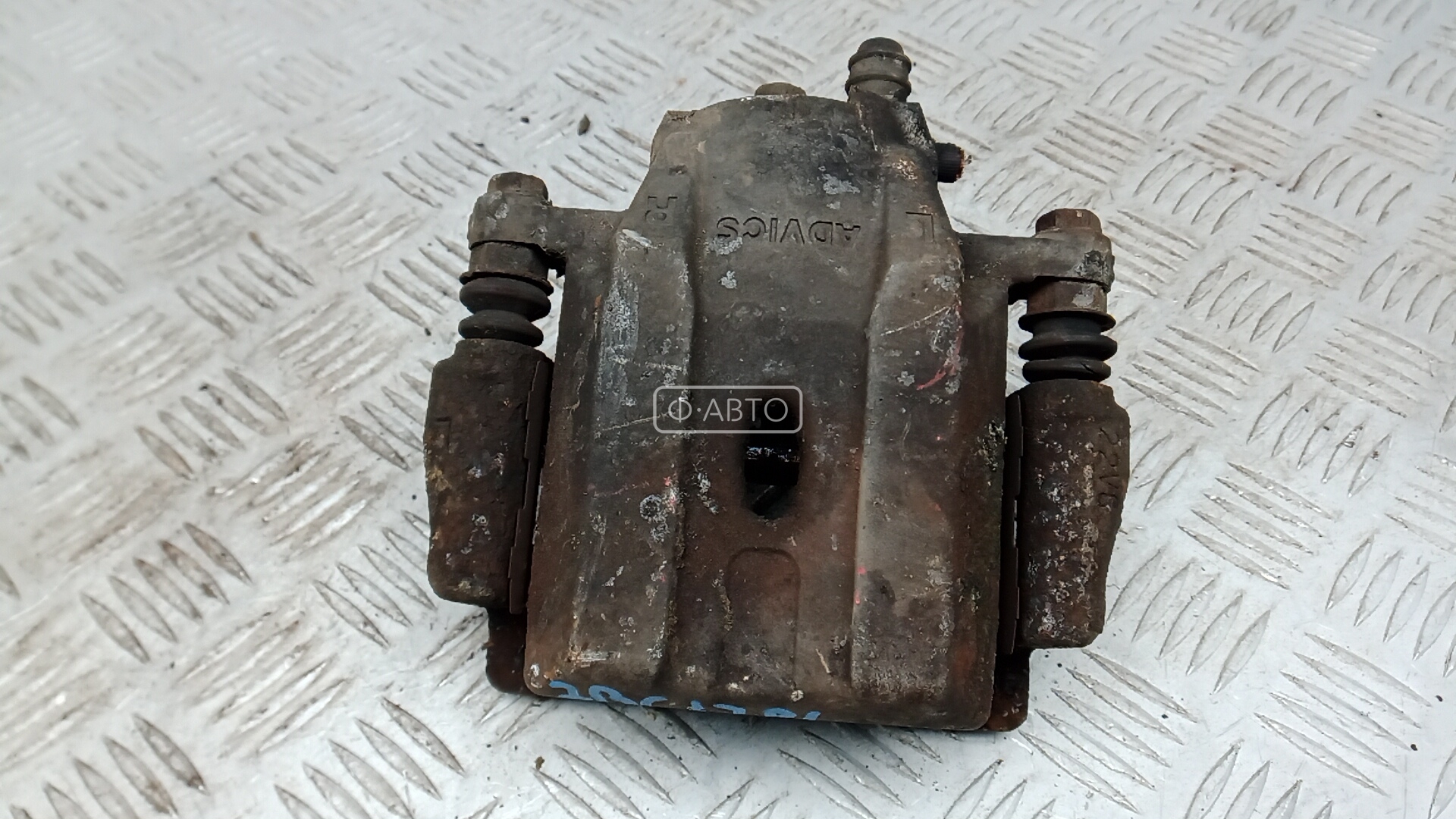 Суппорт тормозной передний левый