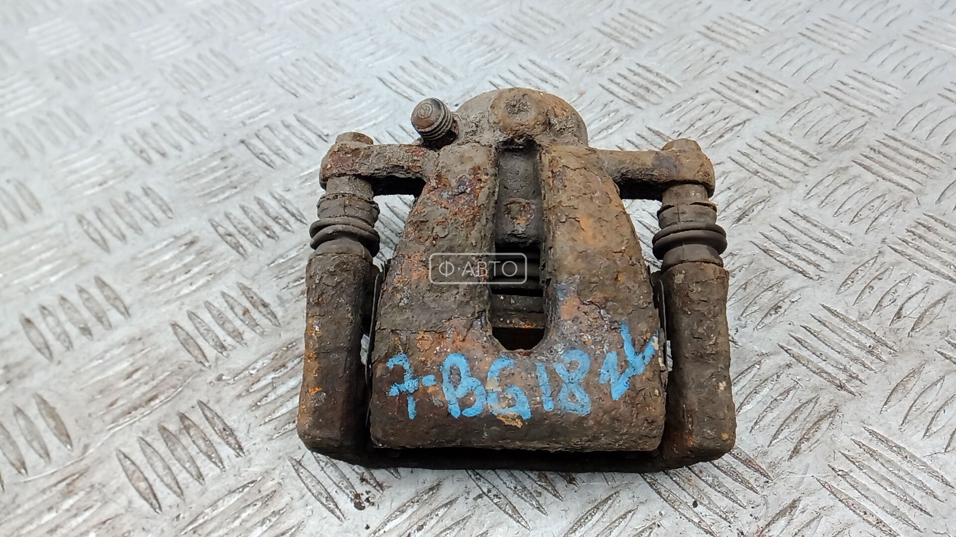 Суппорт тормозной задний левый