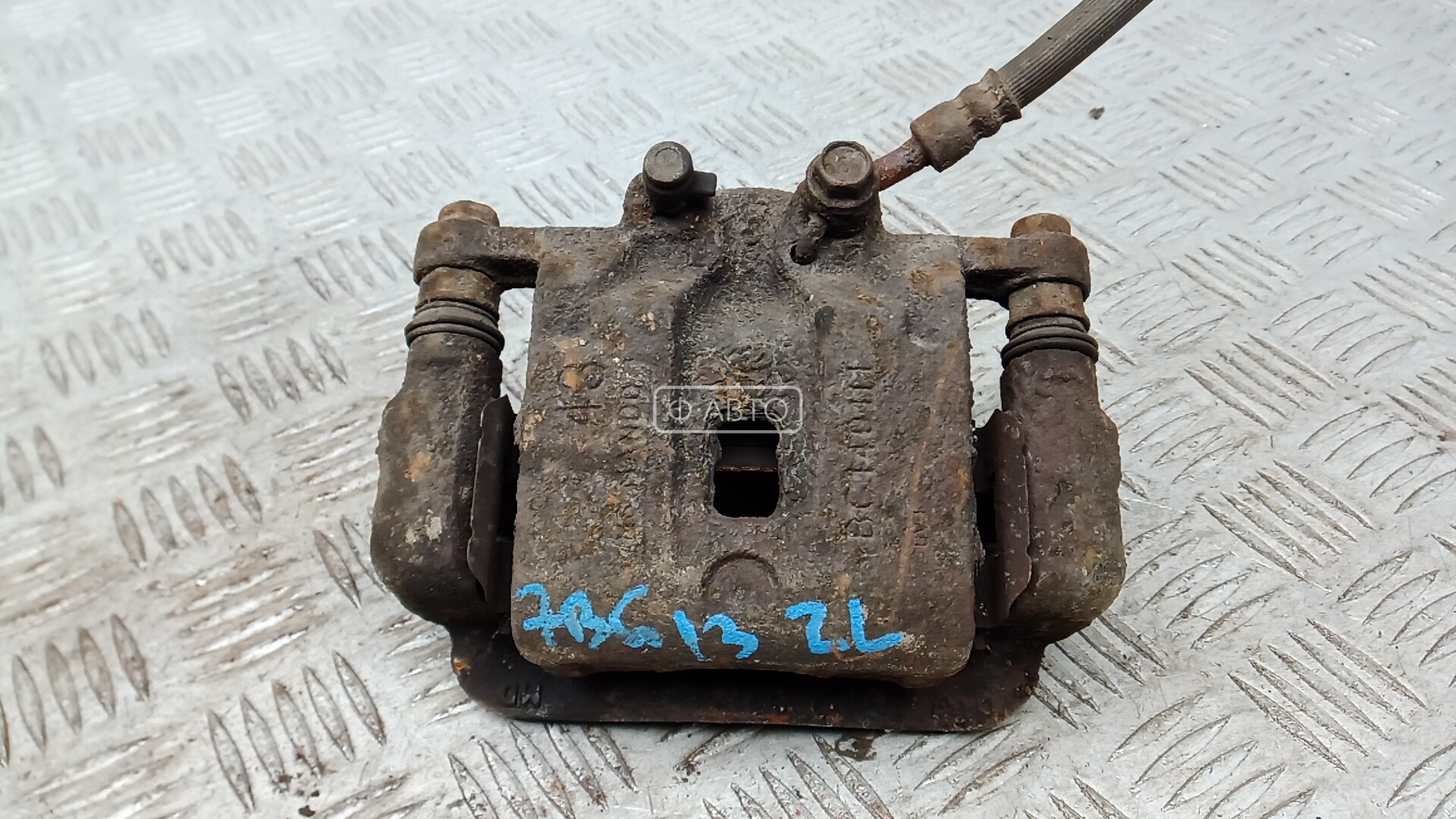 Суппорт тормозной задний левый