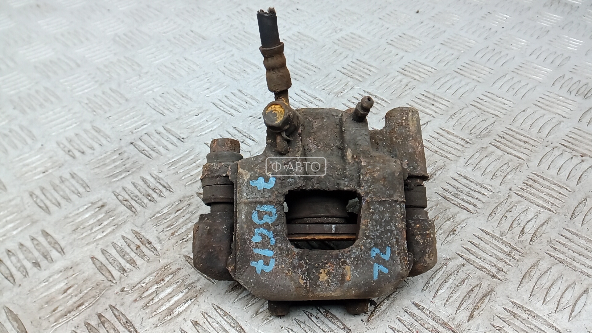 Суппорт тормозной задний левый