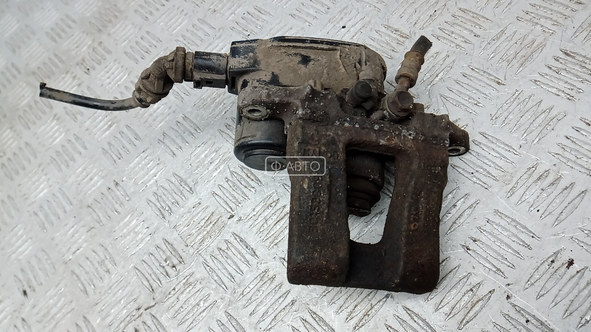 Суппорт тормозной задний левый