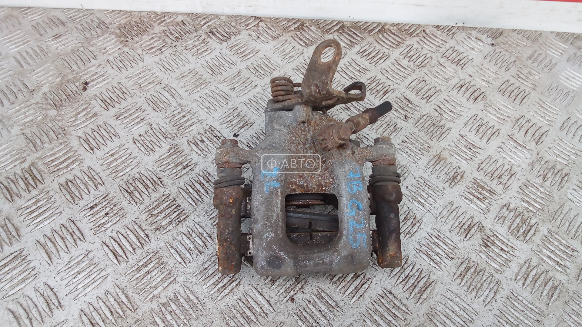 Суппорт тормозной задний левый