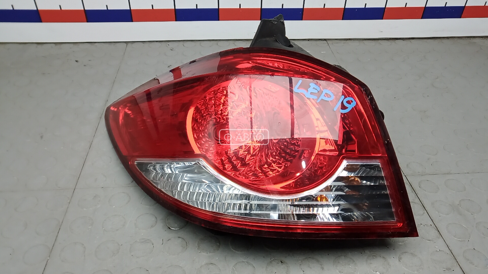 Фонарь задний левый