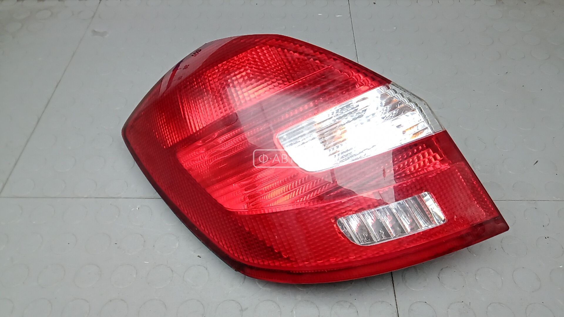 Фонарь задний левый